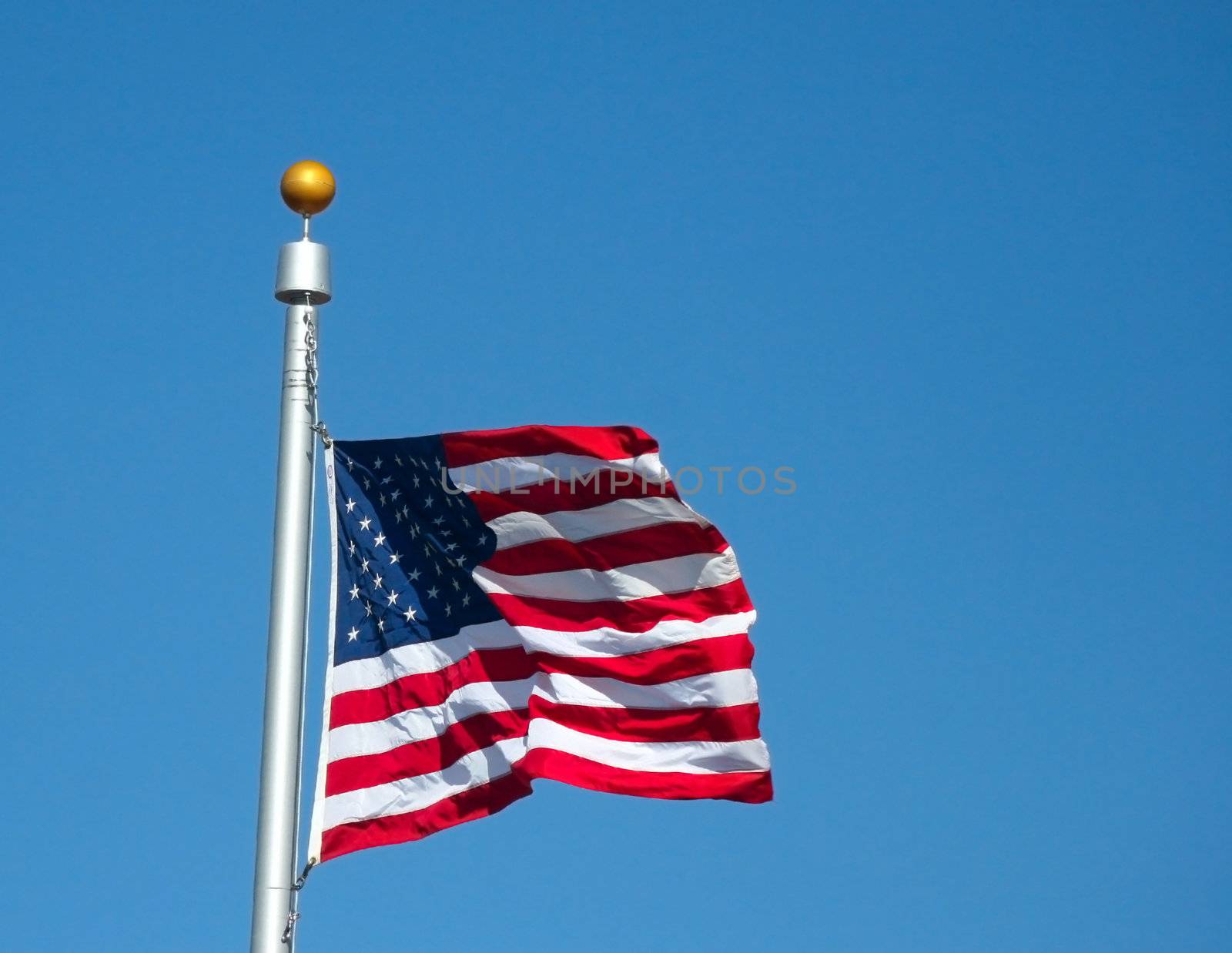 The United States of America Flag snapping in the wind