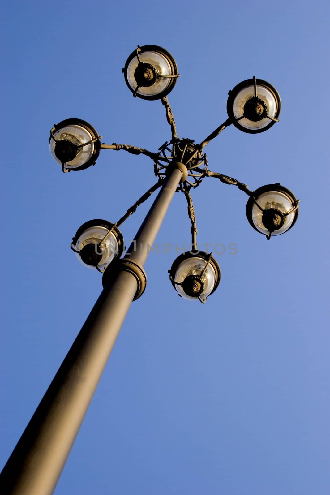 One lamp post on sky background 