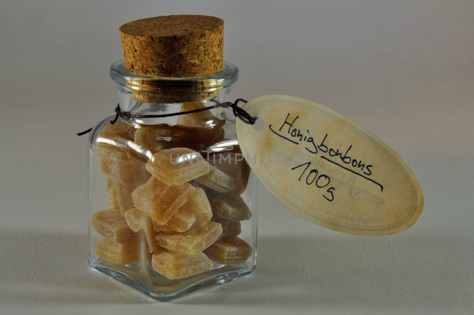 glas of honey candy