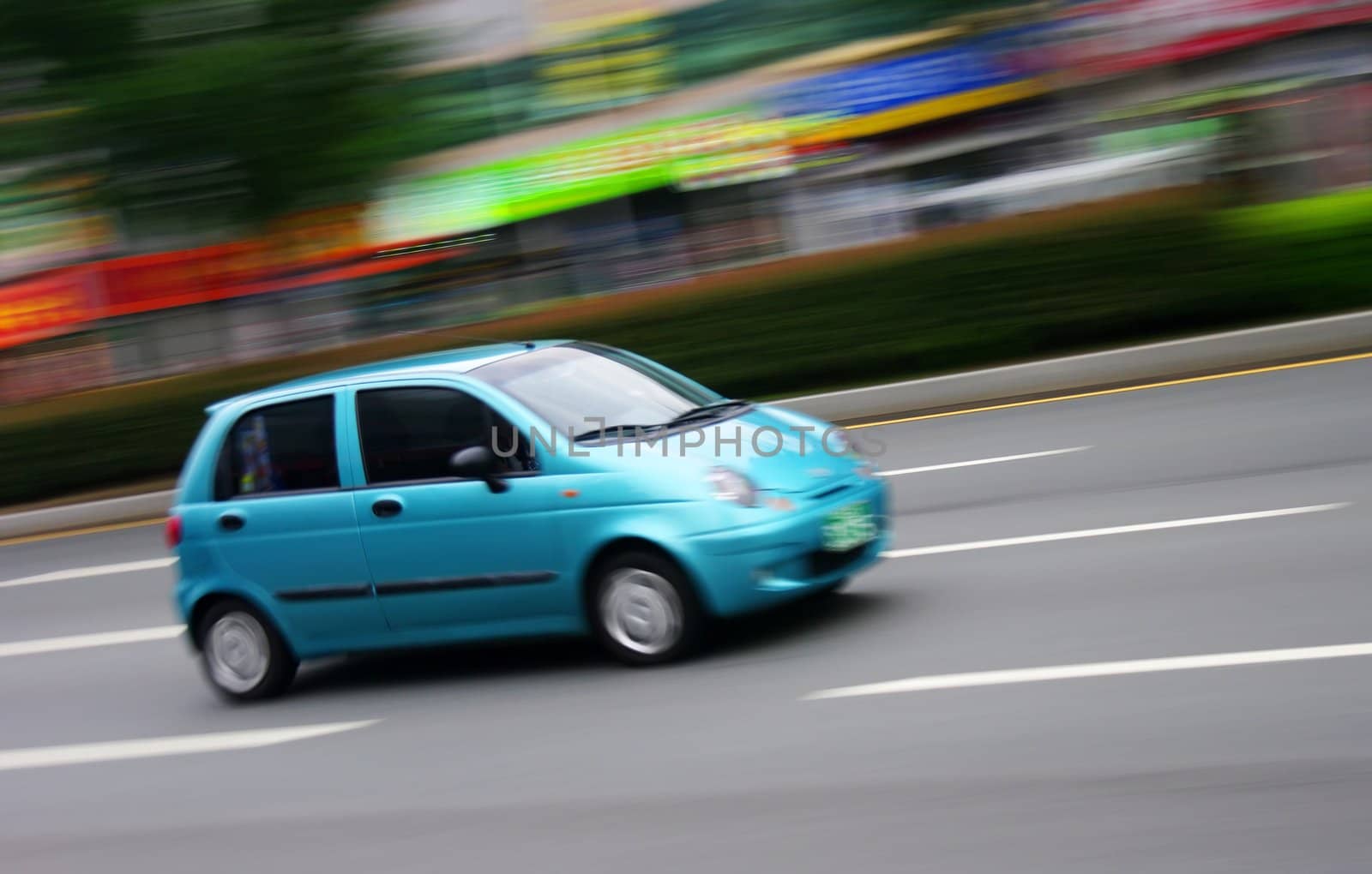 Blue Car with Motion Blur by clickbeetle