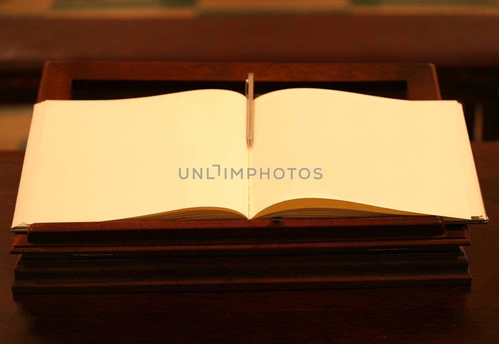Open book with blank yellow pages by jarenwicklund