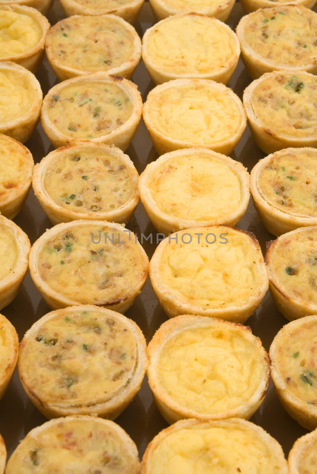 Smoked cheese and herb quiches
