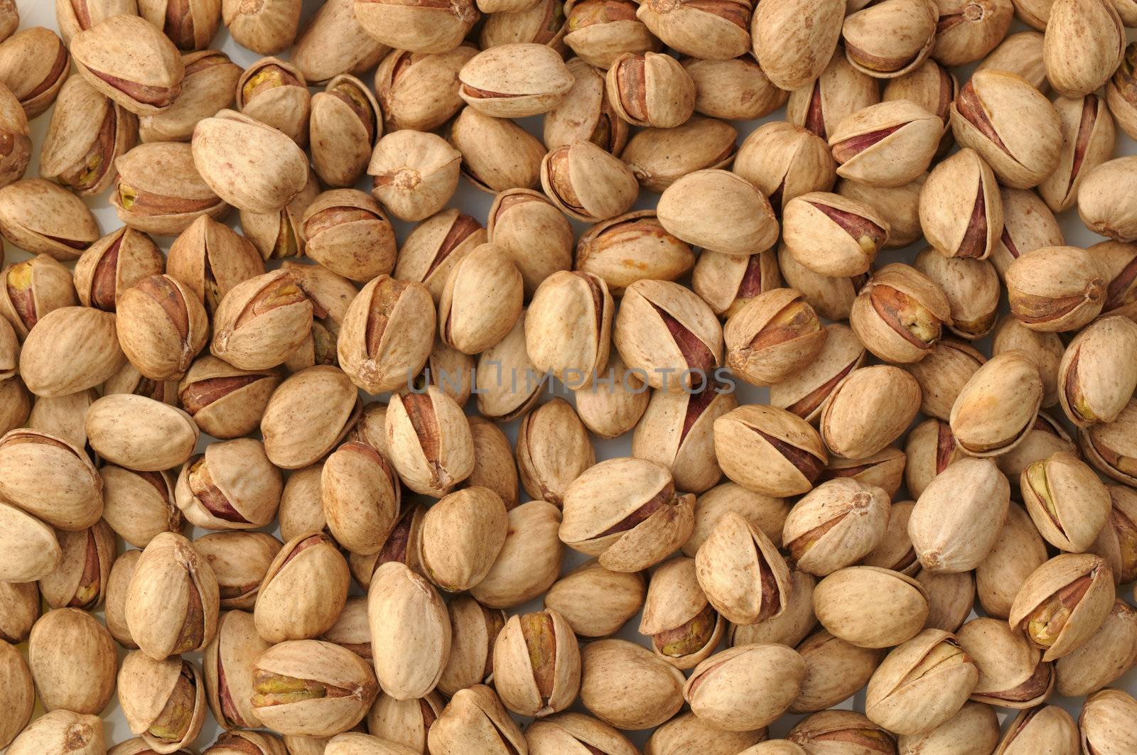 Top view of roasted pistachios in natural light