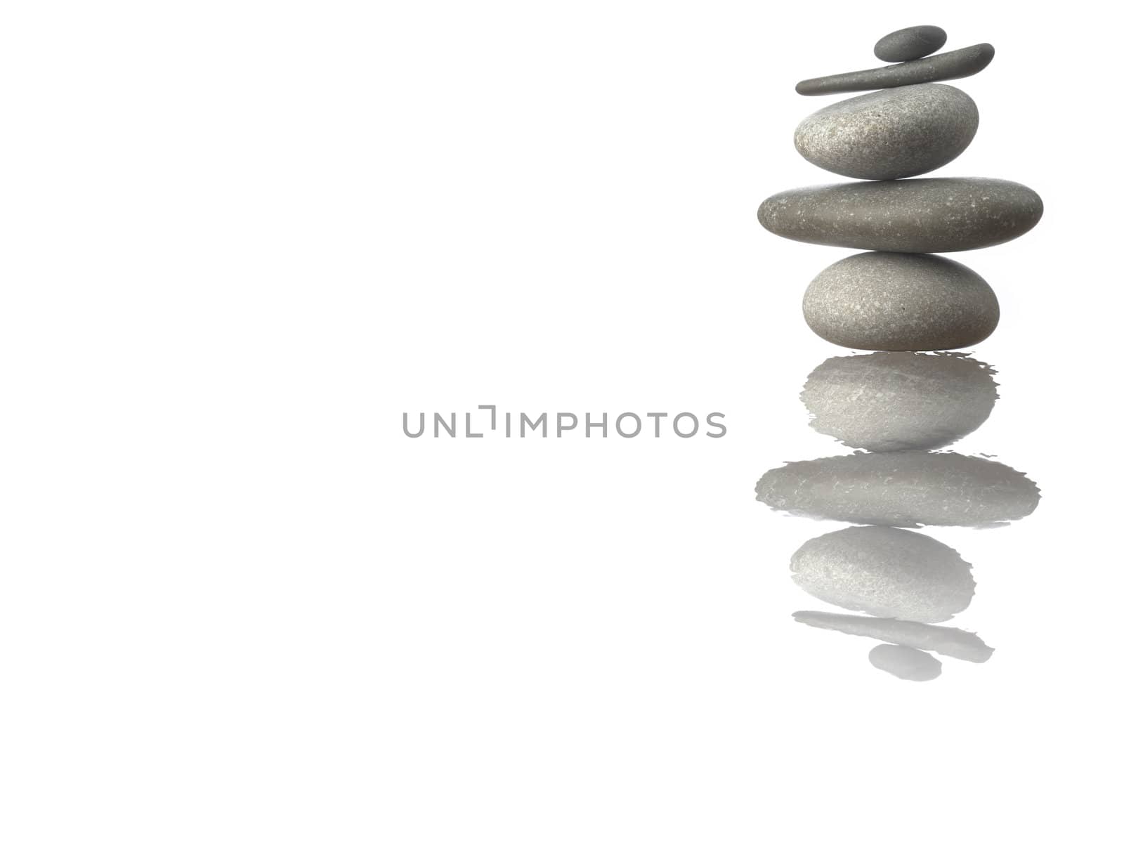 Pyramid of Stones isolated on white. Reflected with Ripple.