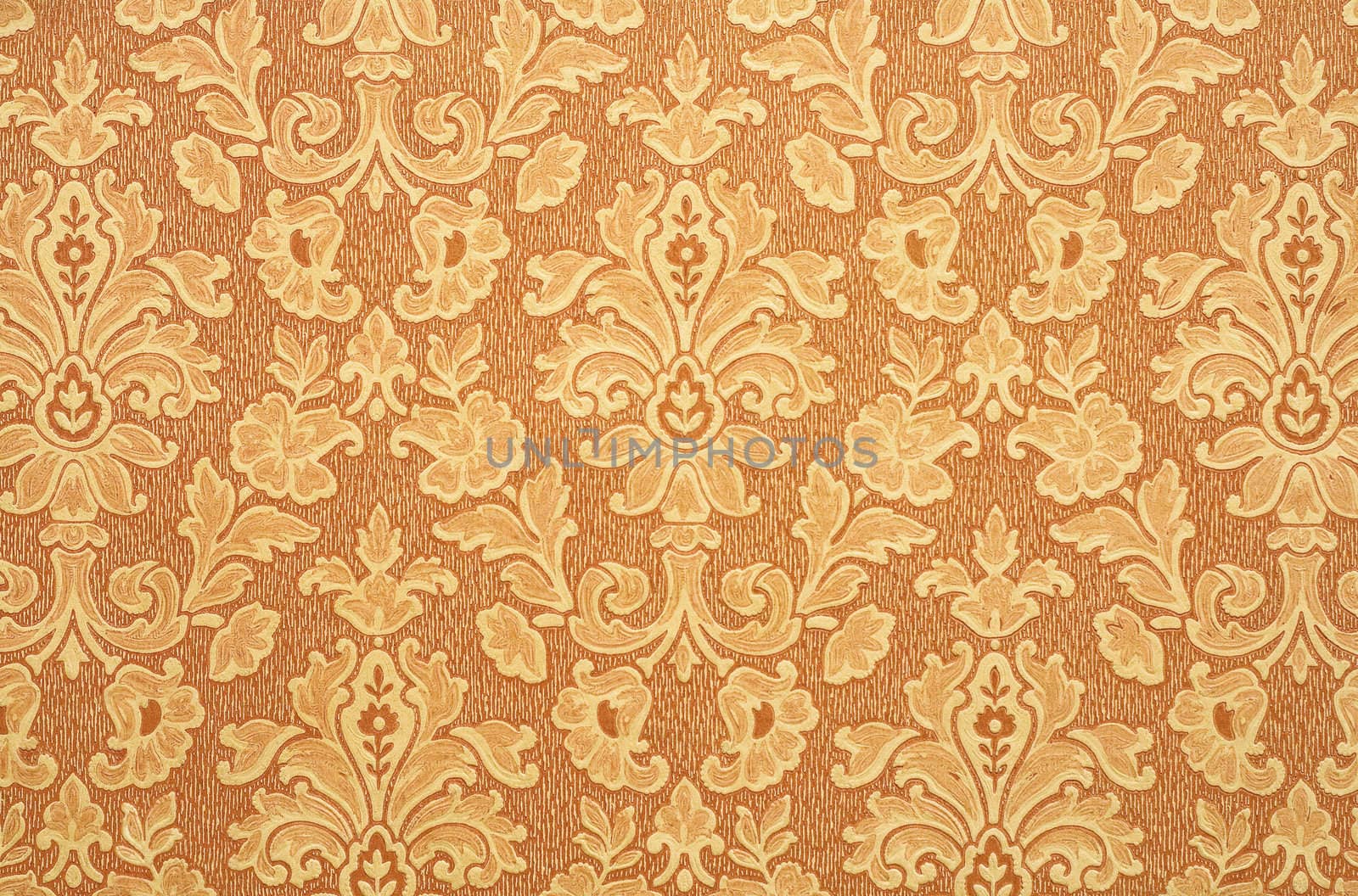 Floral vintage wallpaper background. Old Yellowed orange color.