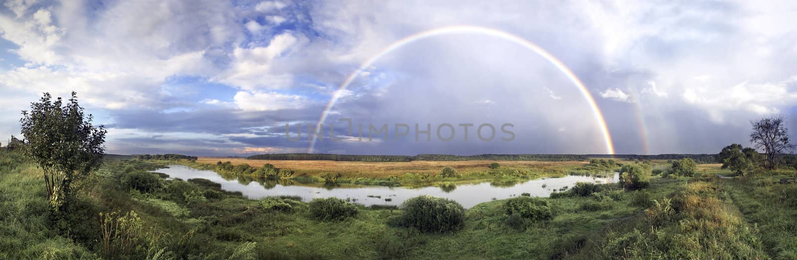 Panorama of rainbow on wood after rain