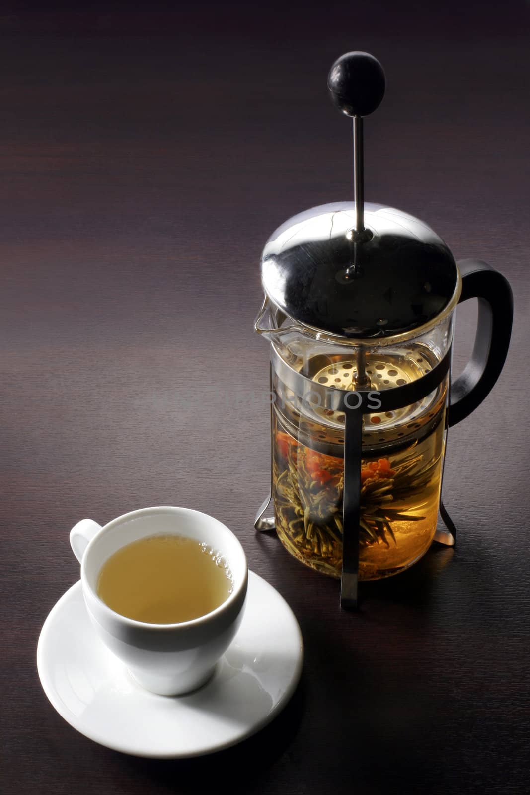 Green tea from press teapot by AlexKhrom