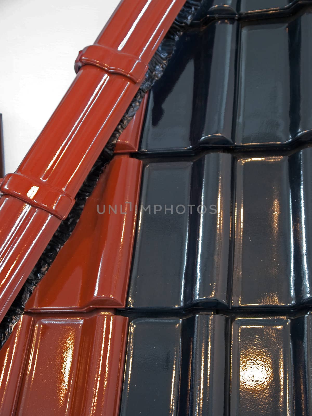 Fragment of modern glazed roof tiles in perspective view background