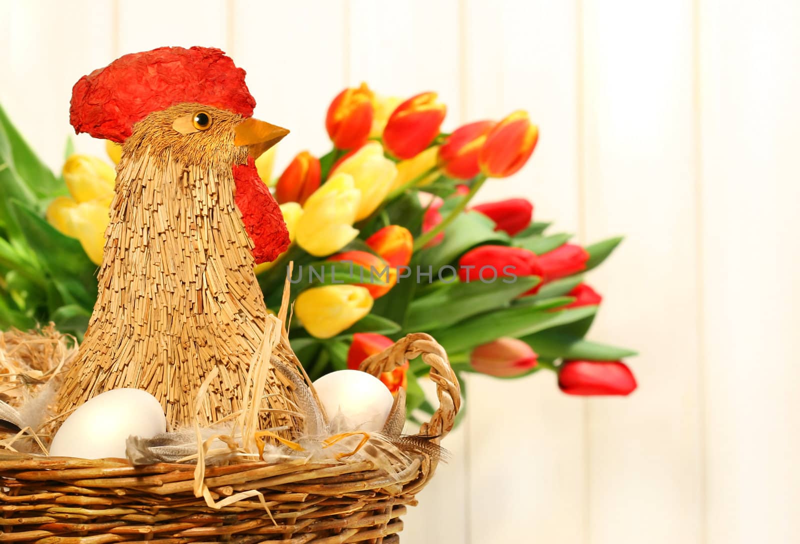 Straw chicken in wicker basket by Sandralise