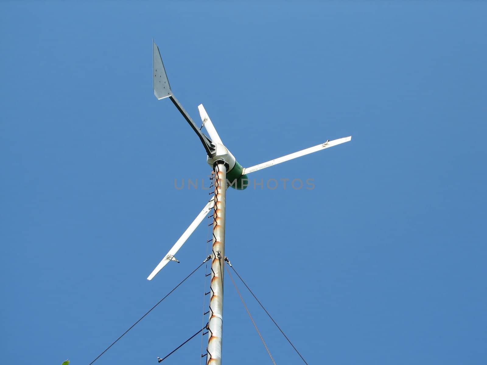 Small windmill on a farm, used to pump water, Germany, 2007