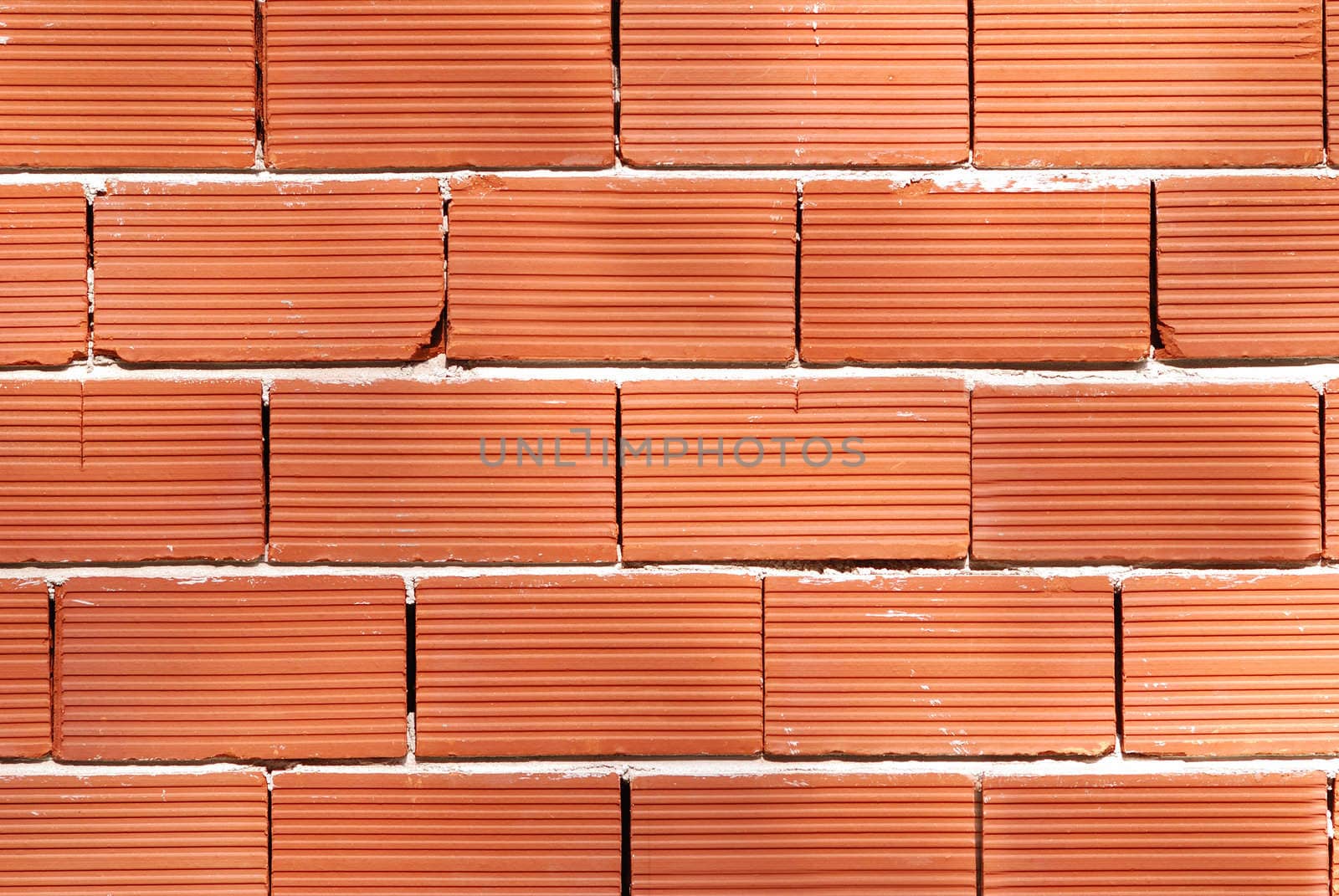 wall from a red bricks. background