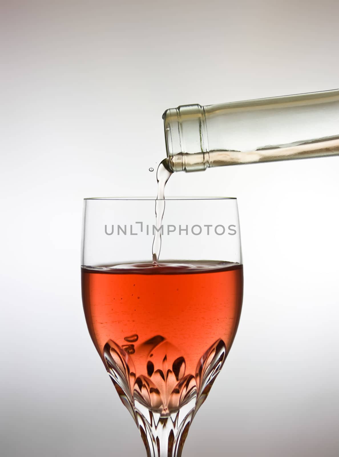 This image shows a glass of delicious red wine