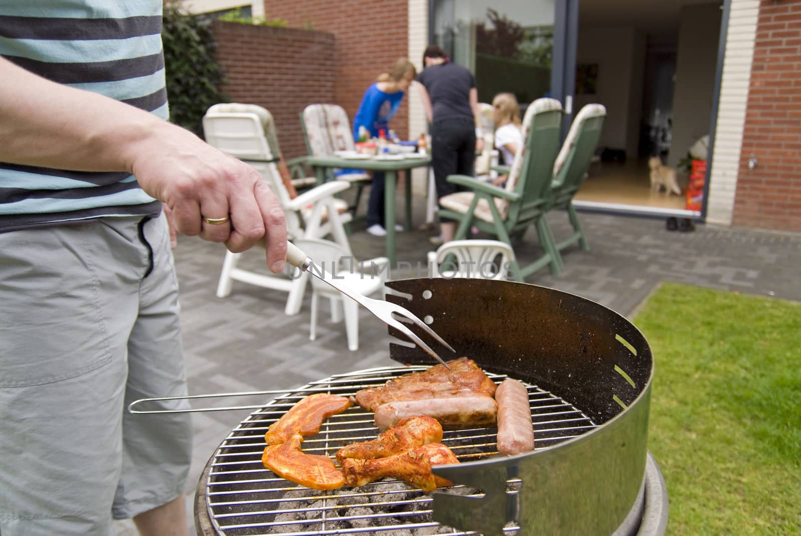 Meat and kebabs on barbecue. by Gertje