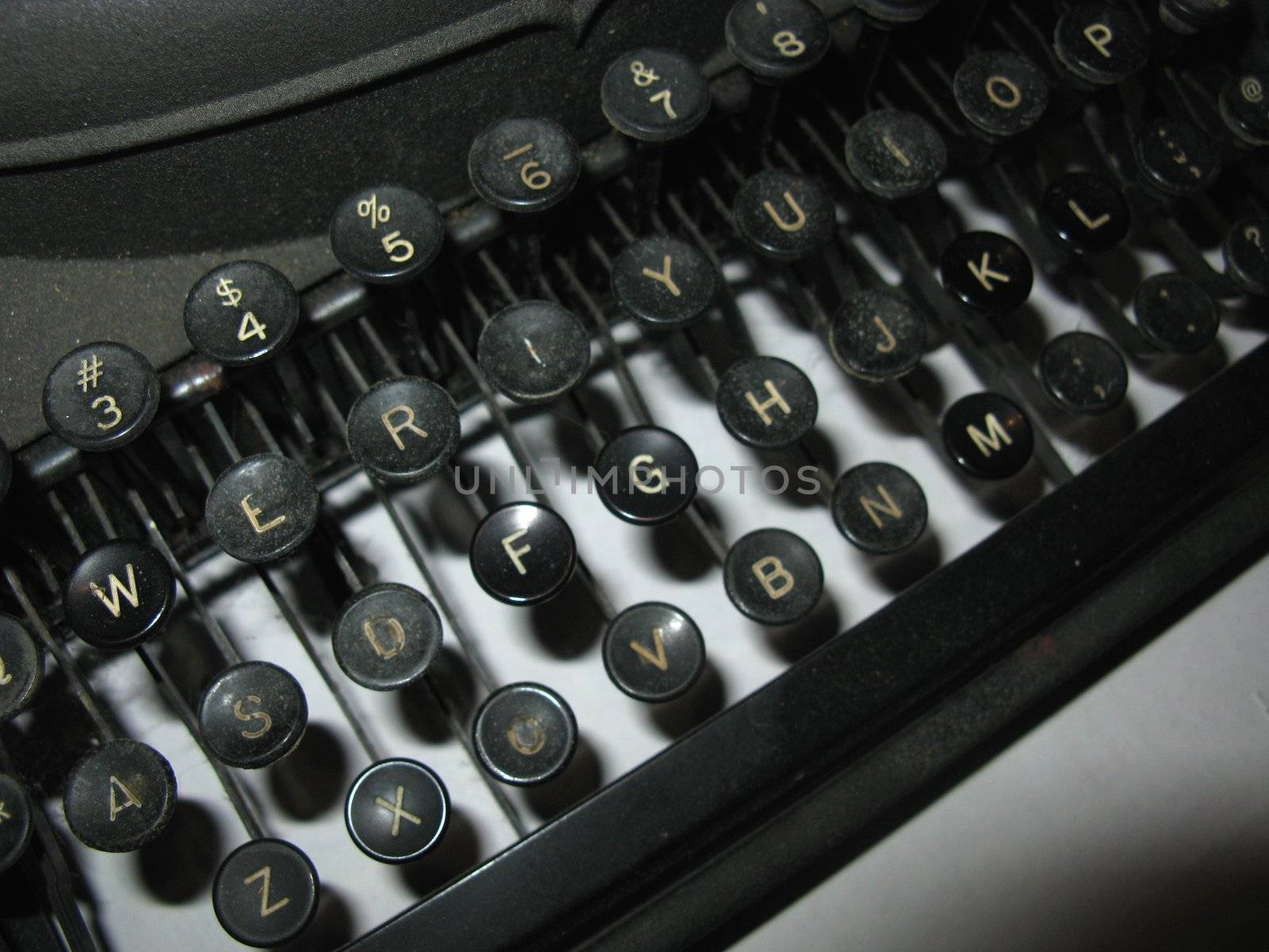 Closeup of vintage typewriter keys. by pbnjphoto