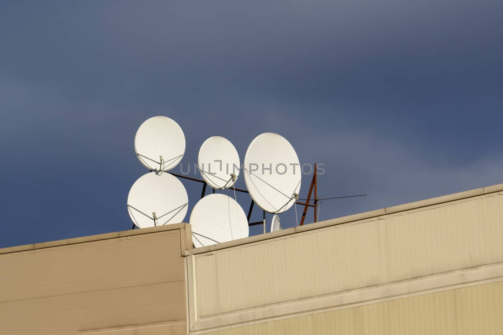 Satellite Antenna Against A Blue Sky