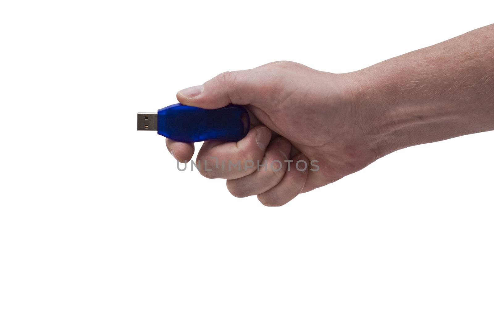 an isolated over white image of a caucasian man's hand holding a blue USB pen drive.