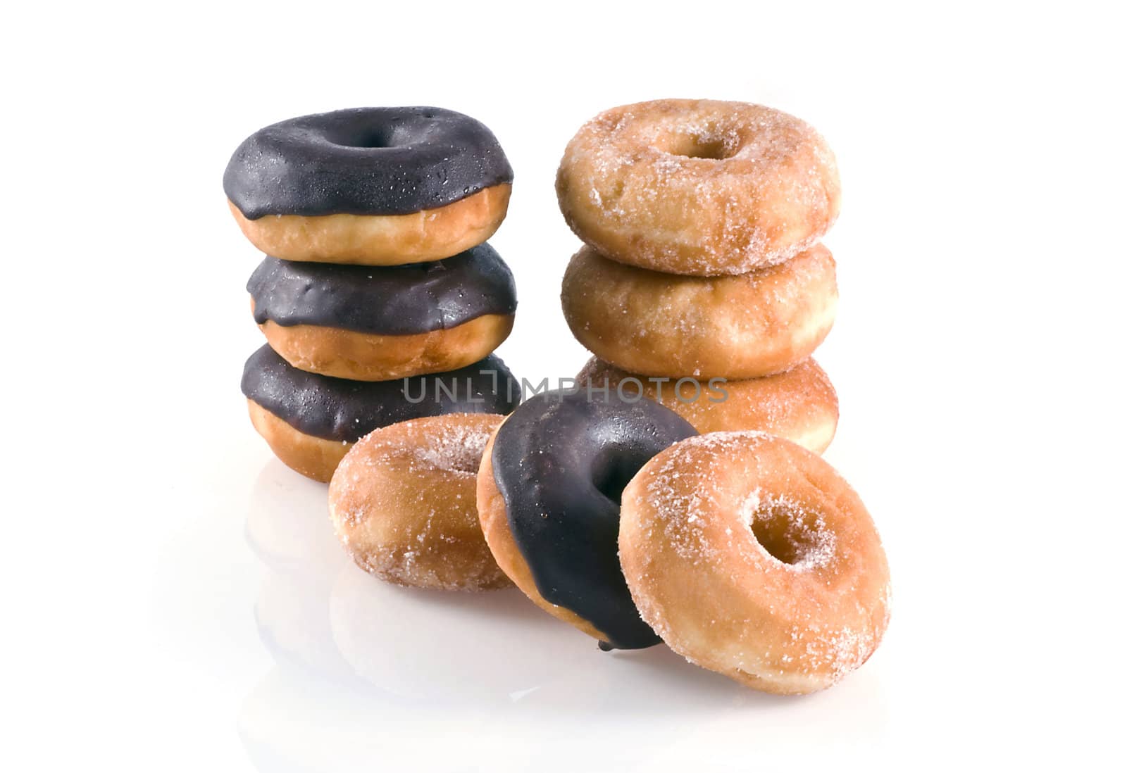Chocolate donuts and donuts covered with sugar, isolated on white.