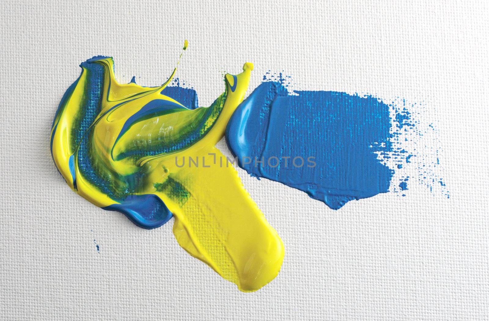 blue and yellow paint applied to canvas with a palette knife