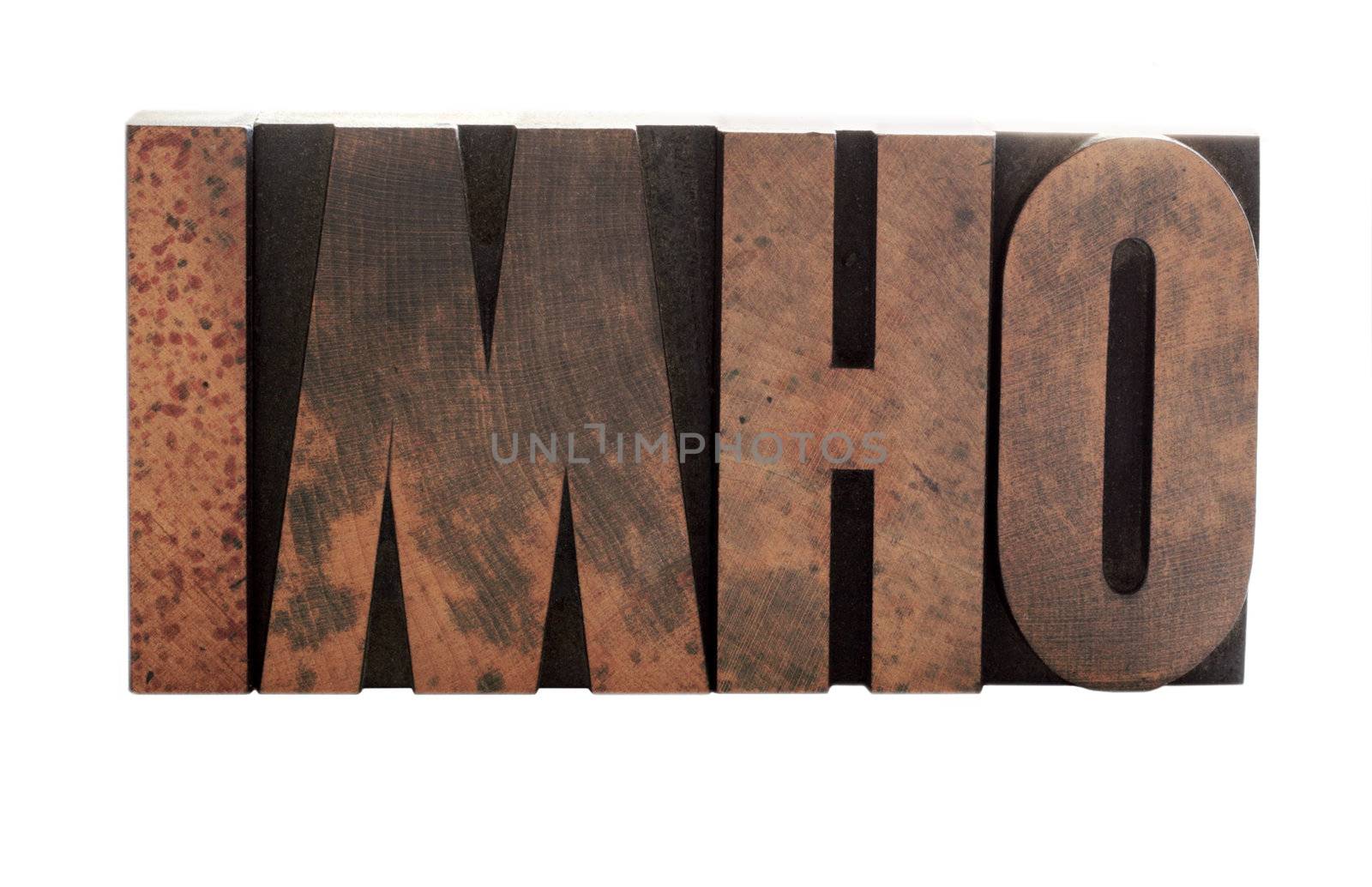 the term 'imho' in old, ink-stained wood letters