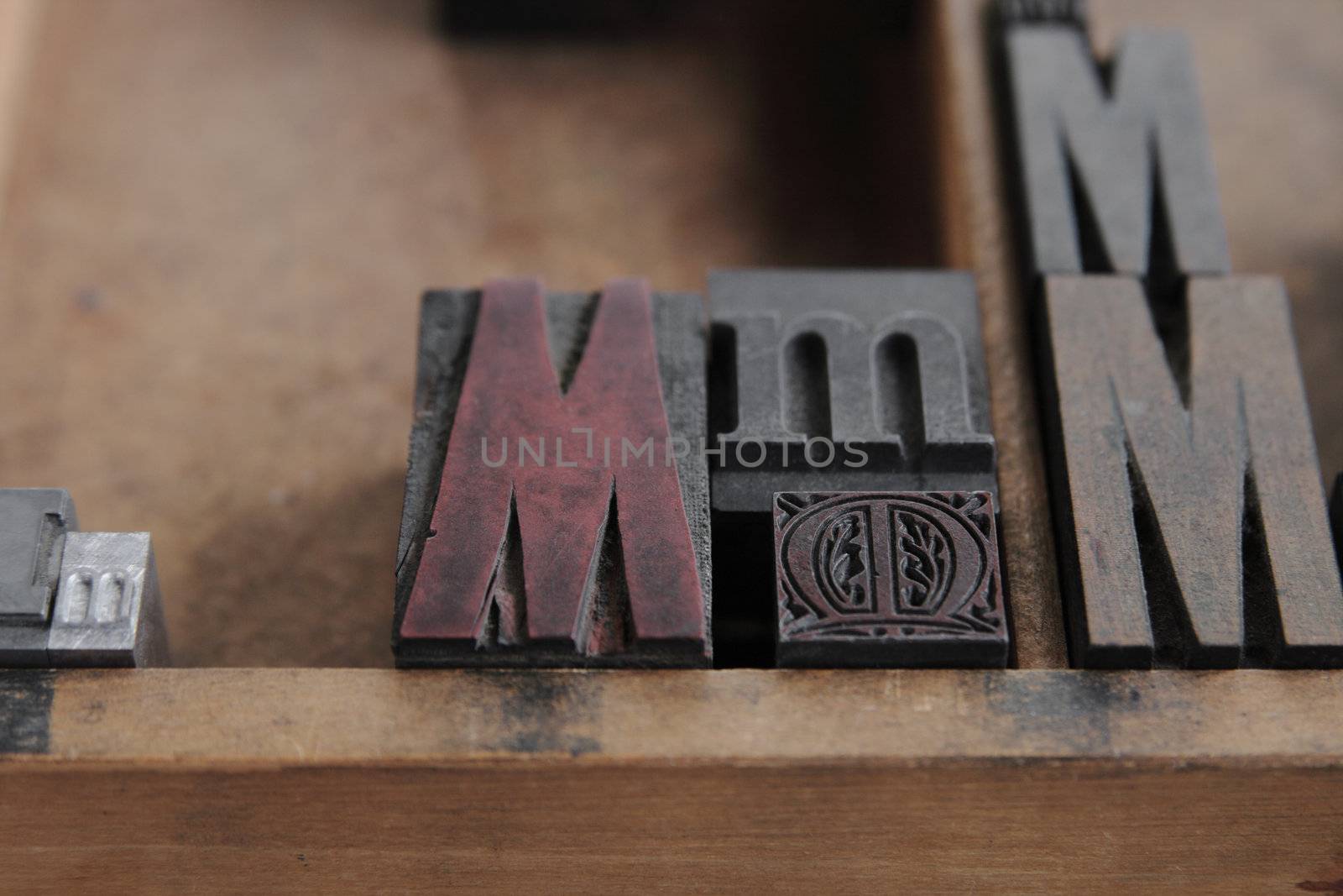 letterpress M in wood and metal in a type case by nebari