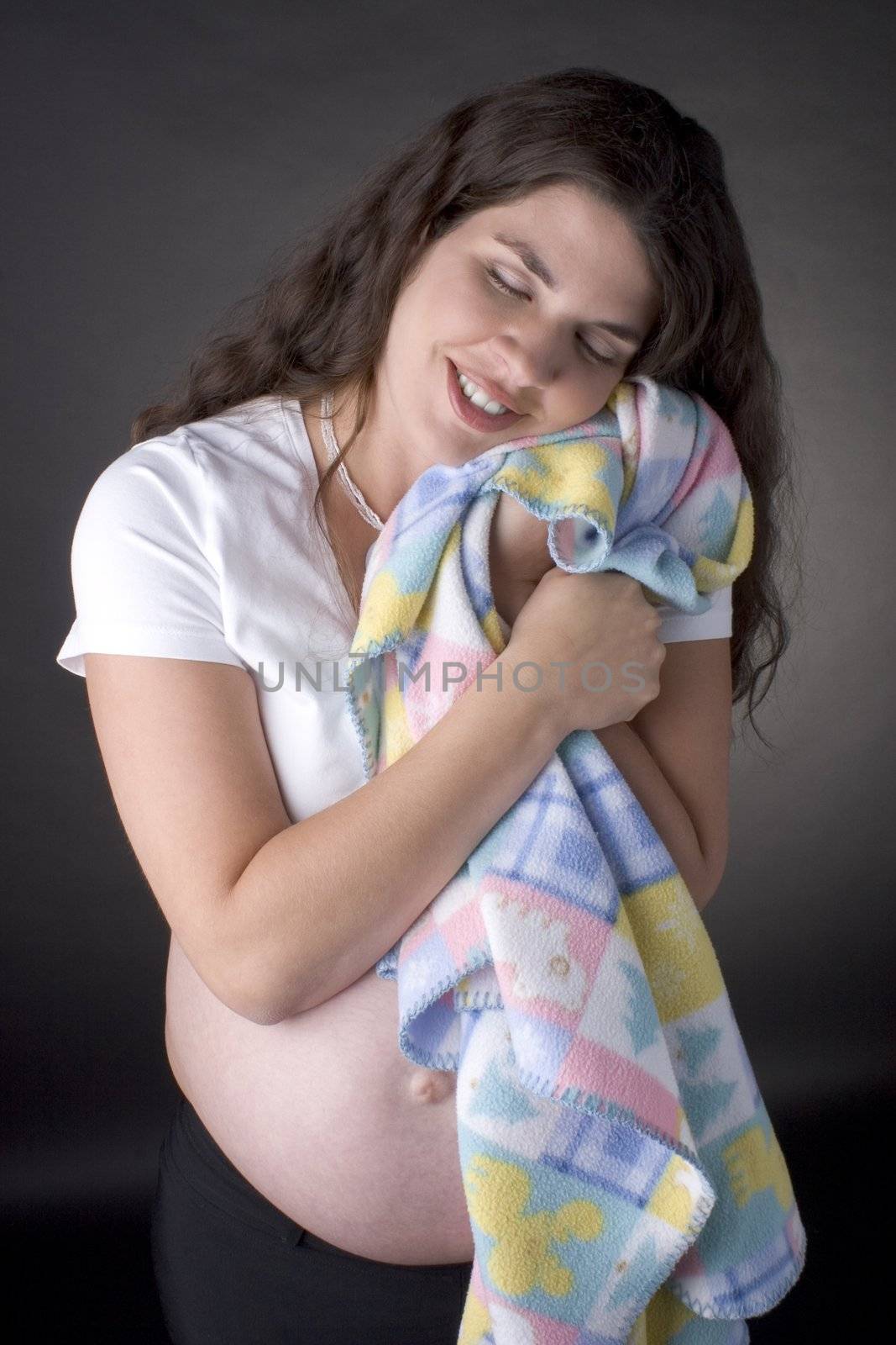 Women pregnant and blanket by mypstudio