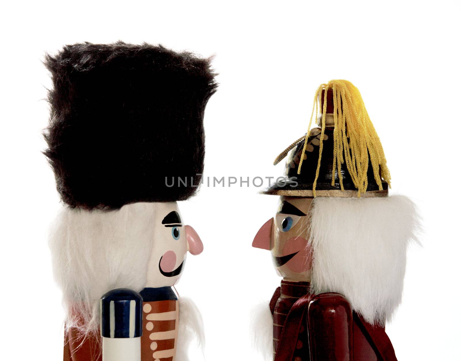 two nutcracker soldiers face to face isolated on white