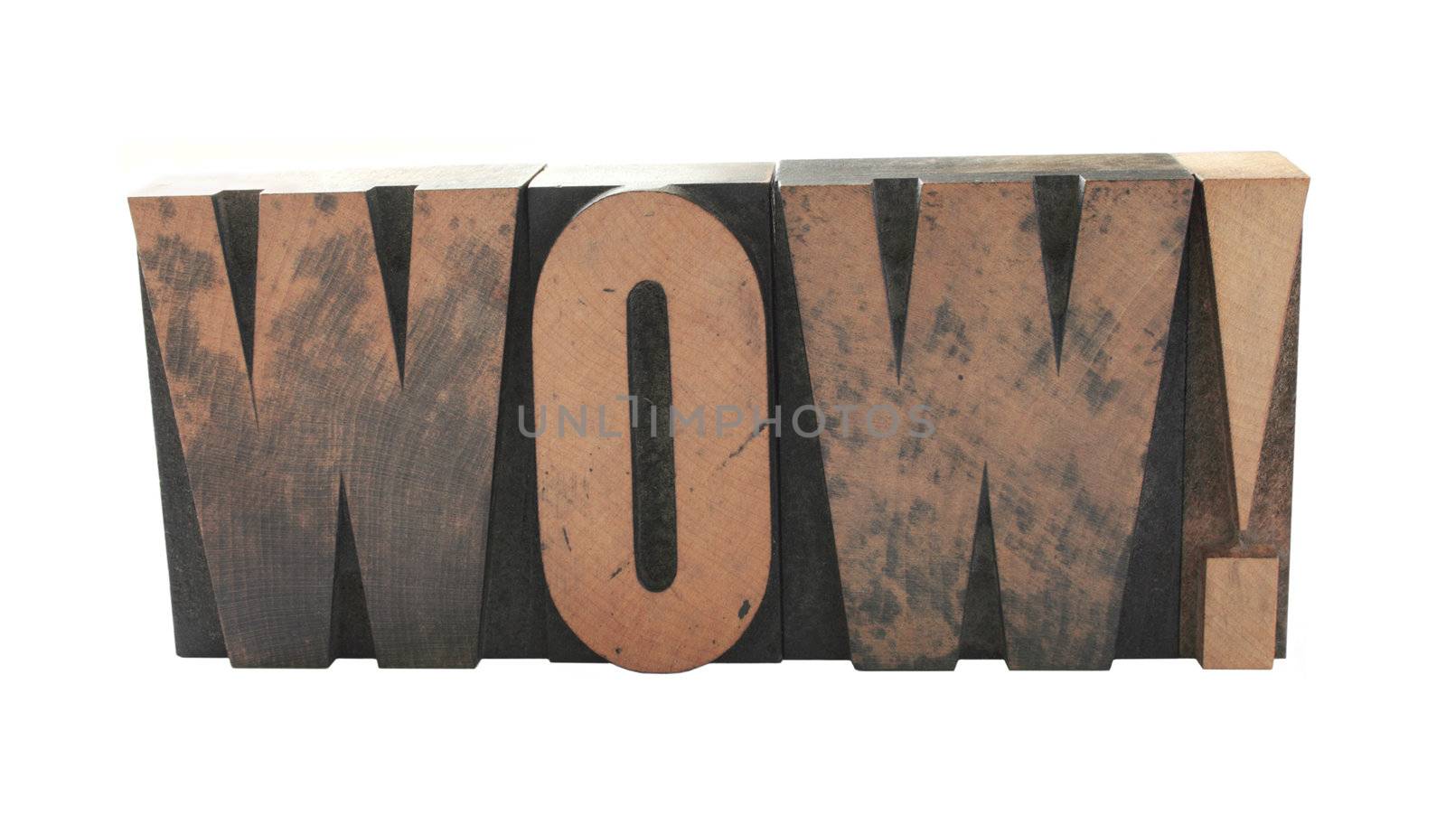 the word 'wow' in old wood type letters