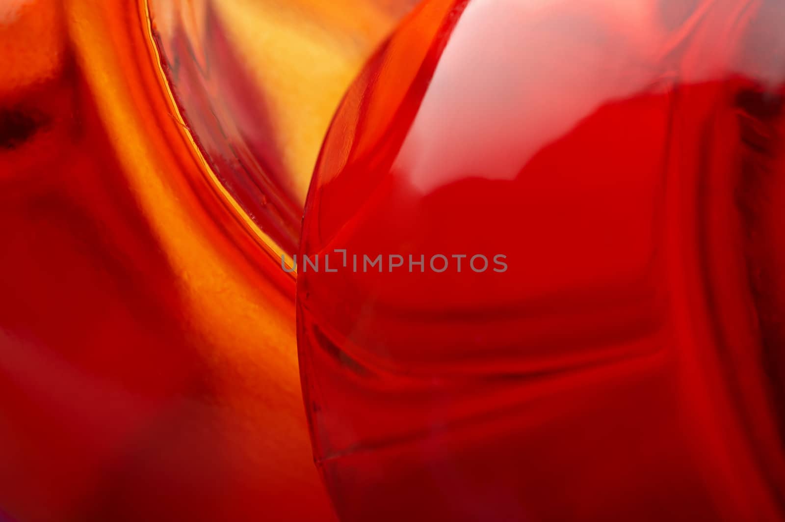 Abstract macro close up of two red glass object