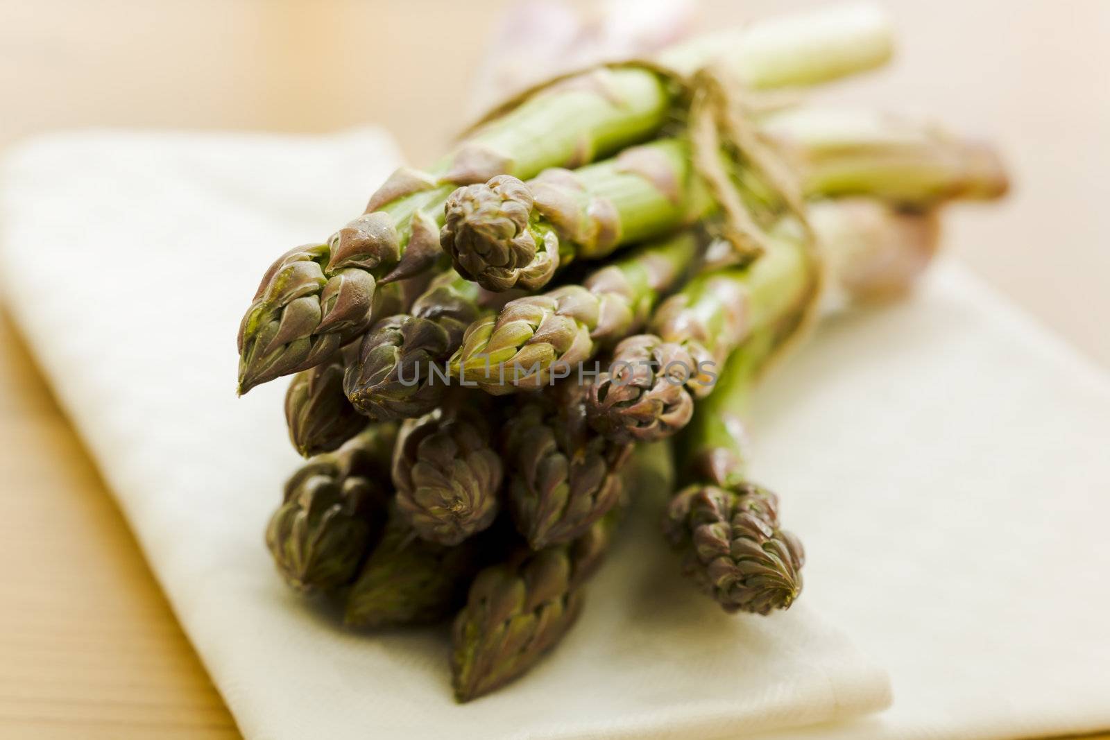 Pile of asparagus on the kitchen table