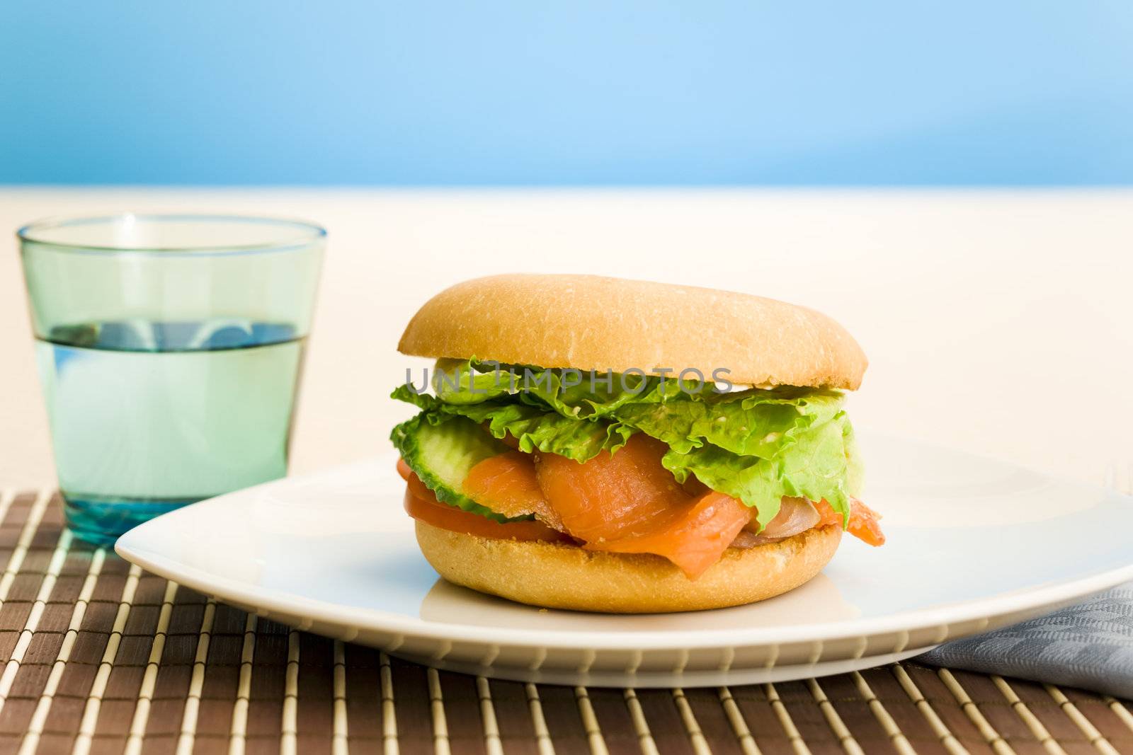 Cold smoked salmon bagel on the table