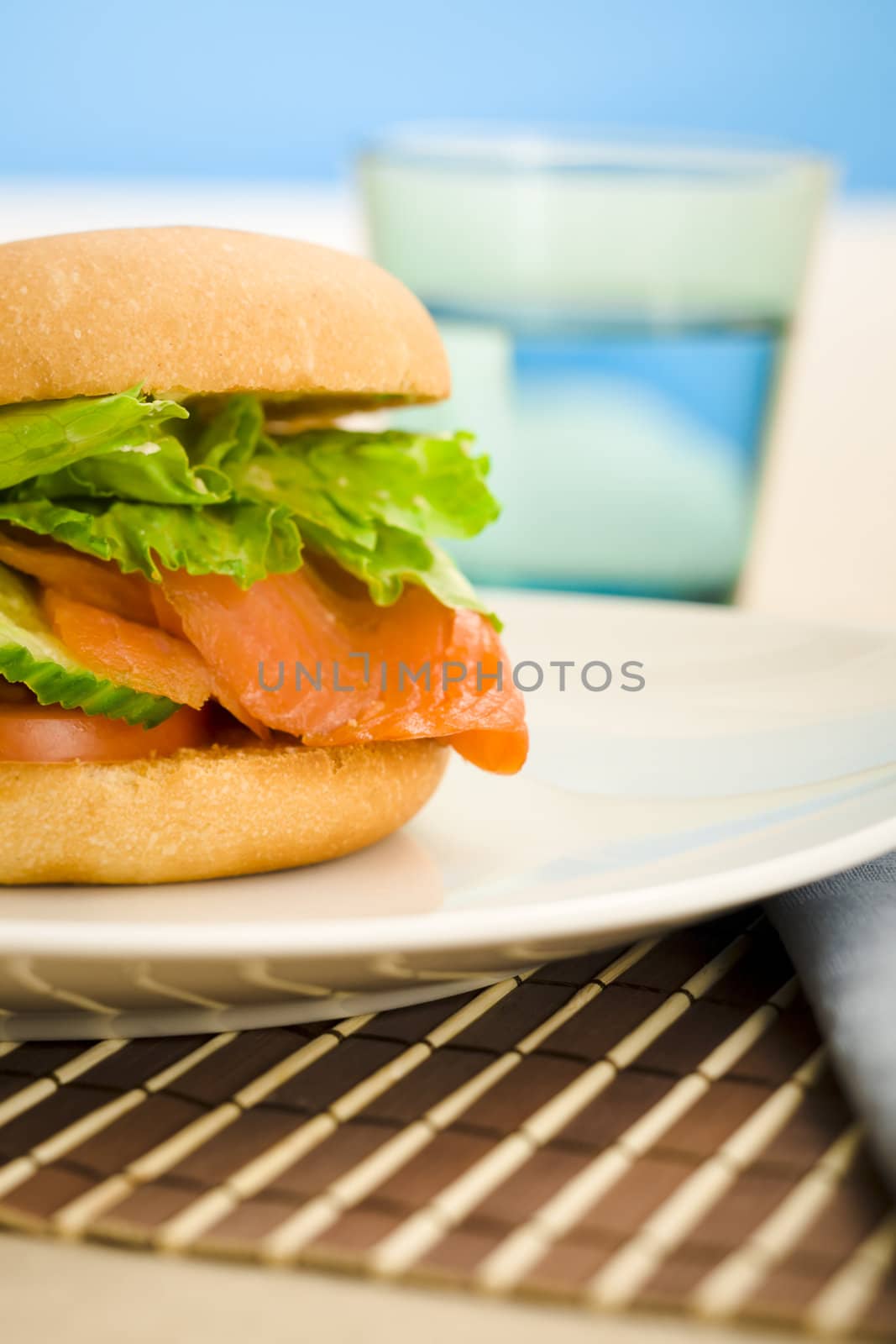 Cold smoked salmon bagel on the table