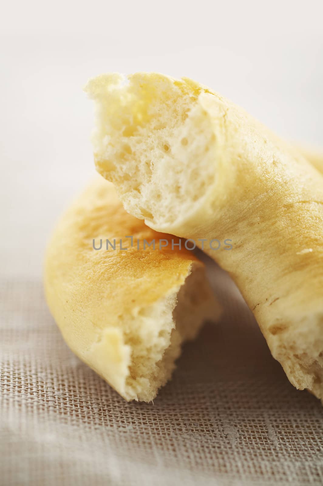 Piece of wheat bagel on the table