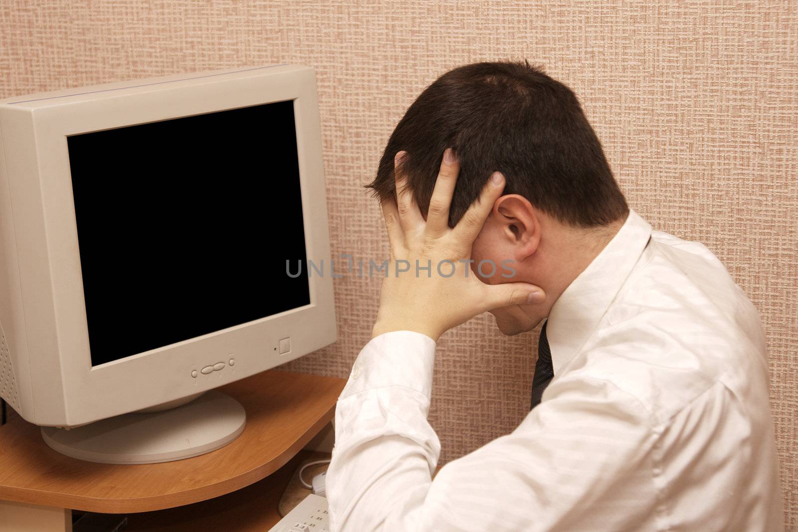 thinking man at office