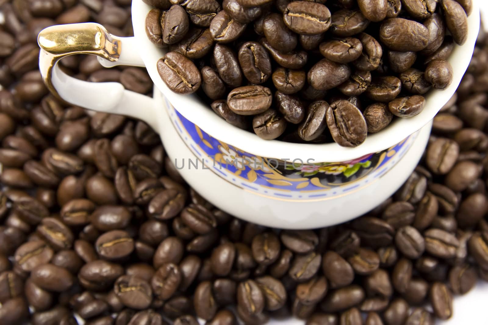 Half cup of coffee on white and brown