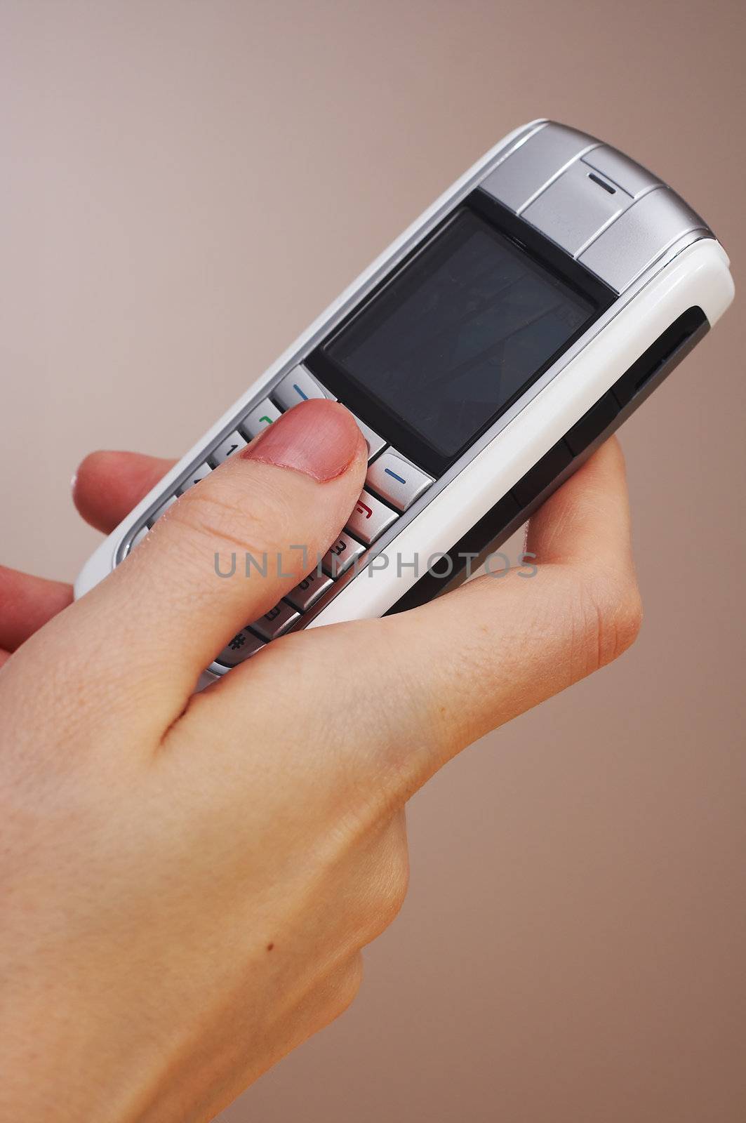 Woman holding a mobile phone