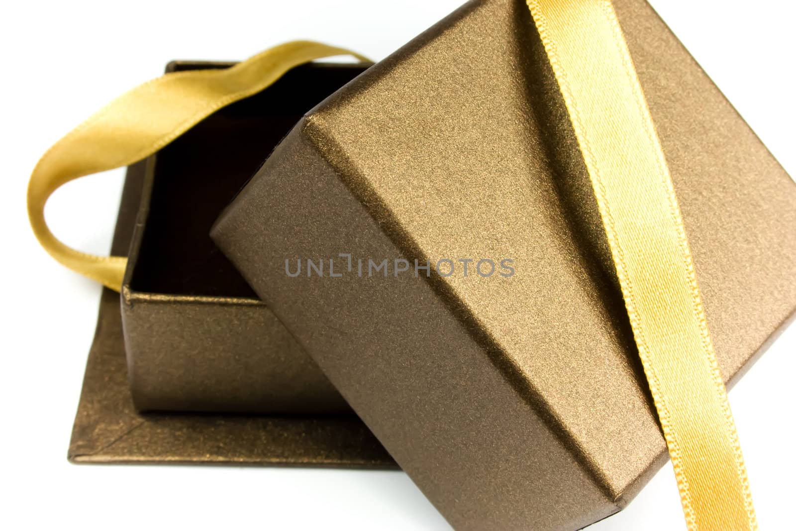 Open gift box with gold ribbon by Adiasz