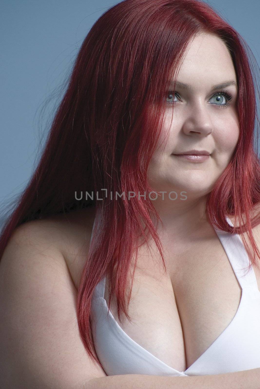 Twenty something model with bright red hair