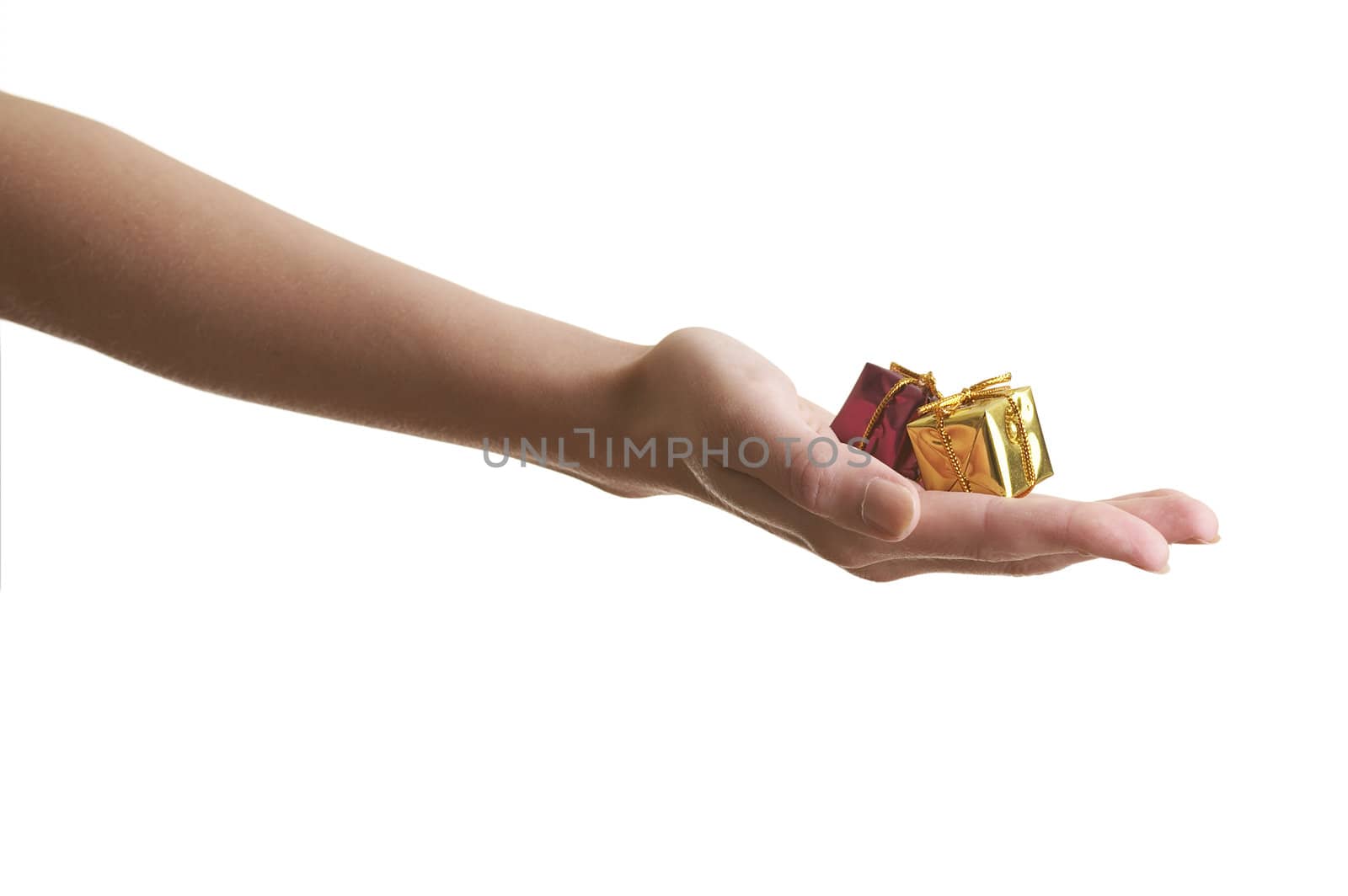 Girl offering two miniature gift boxes over a white background