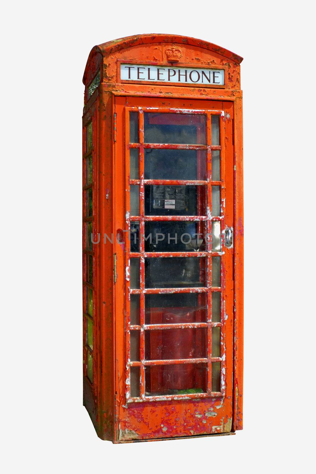 A grungy British telephone box, isolated on a white background. (Clipping path included)