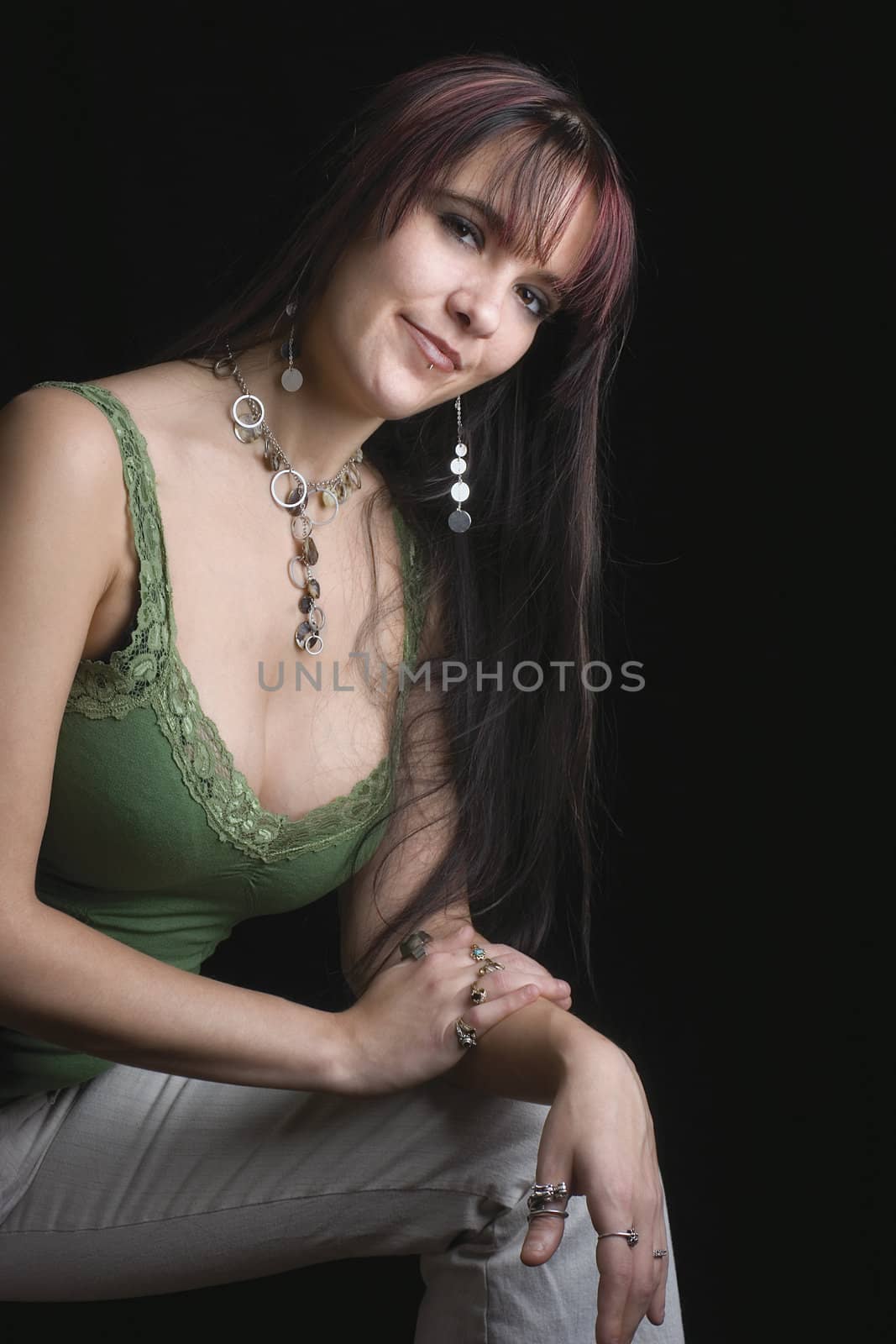 Close up portrait of fashion model leaning on one leg with shy smile