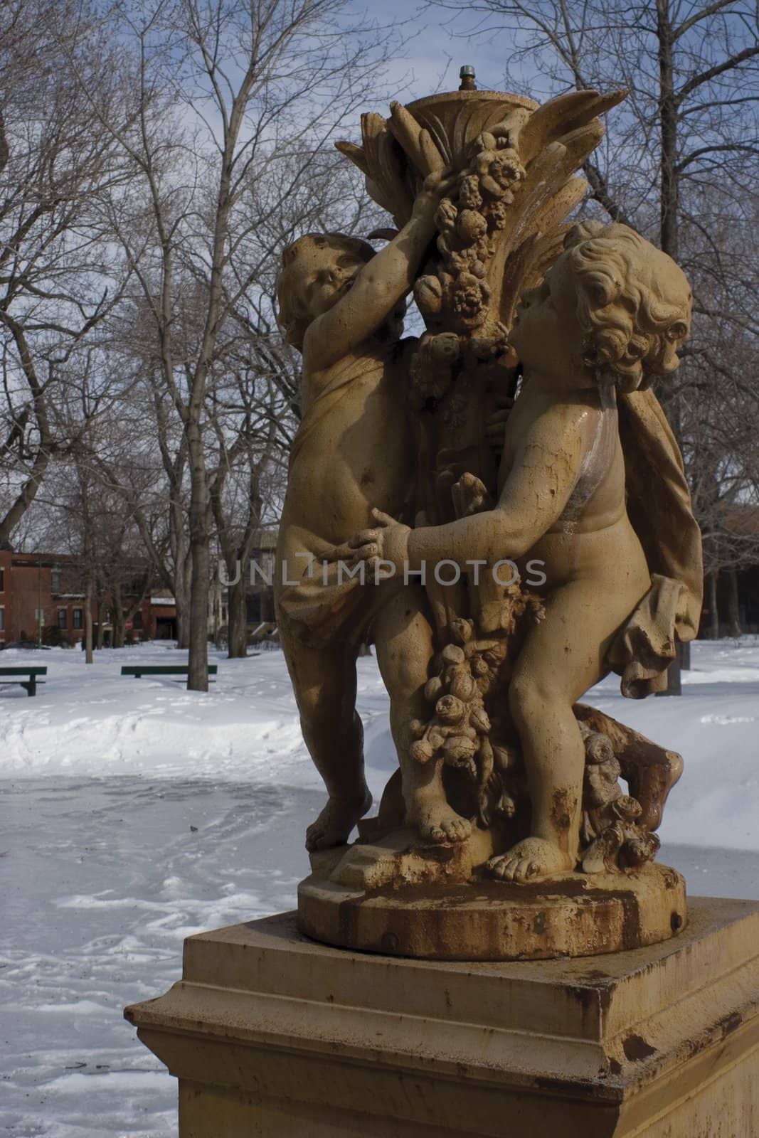 Cherubin statue in winter park