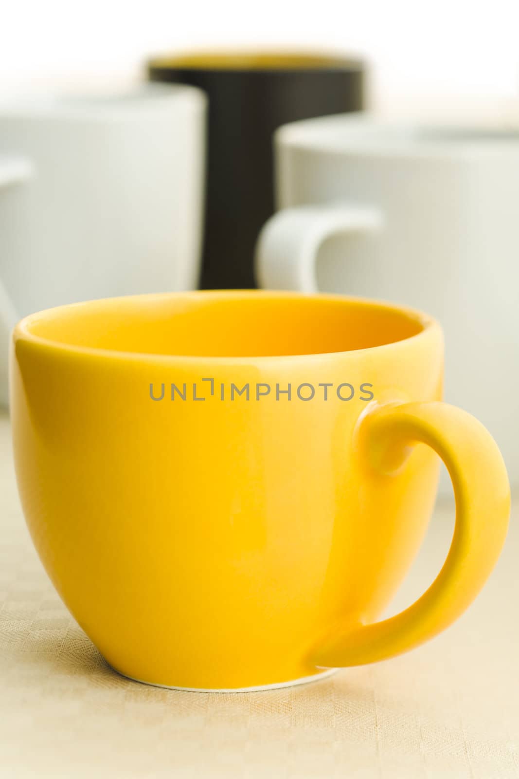 Different coffee cups on the kitchen table