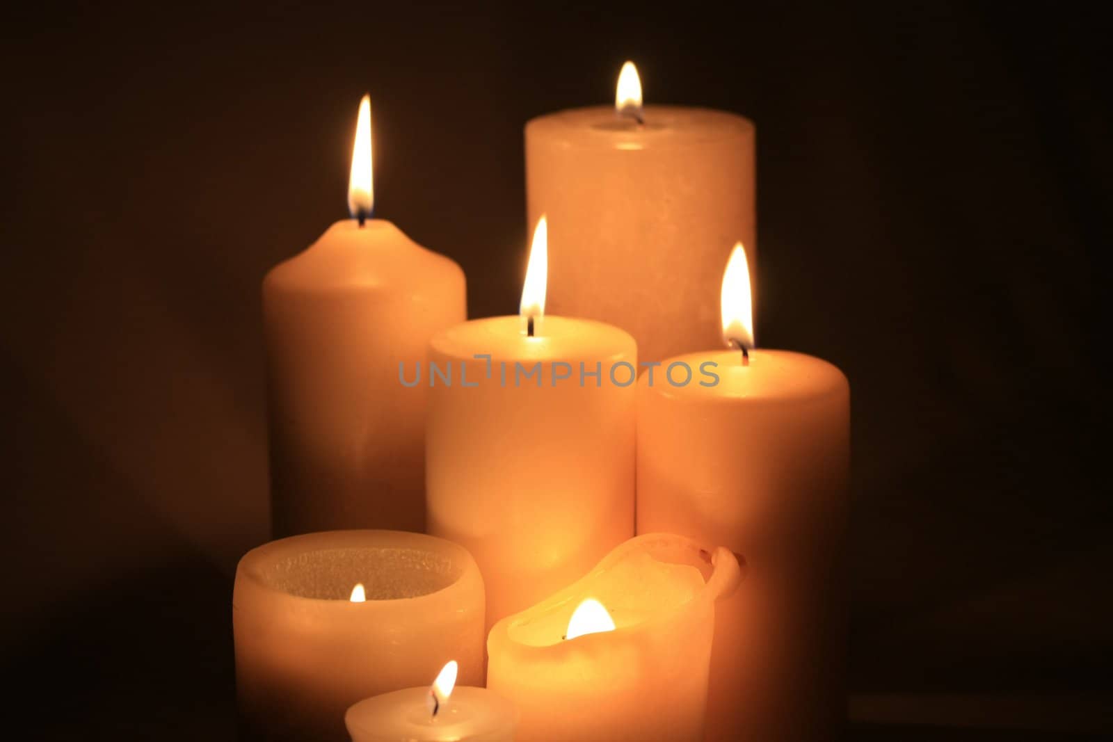 group of candles by studioportosabbia
