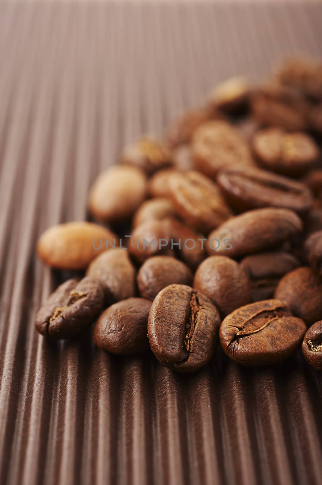 Coffee beans close-up with the shallow dof