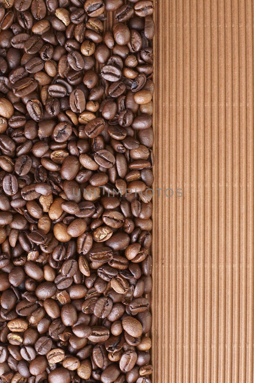Coffee beans on the brown card board 