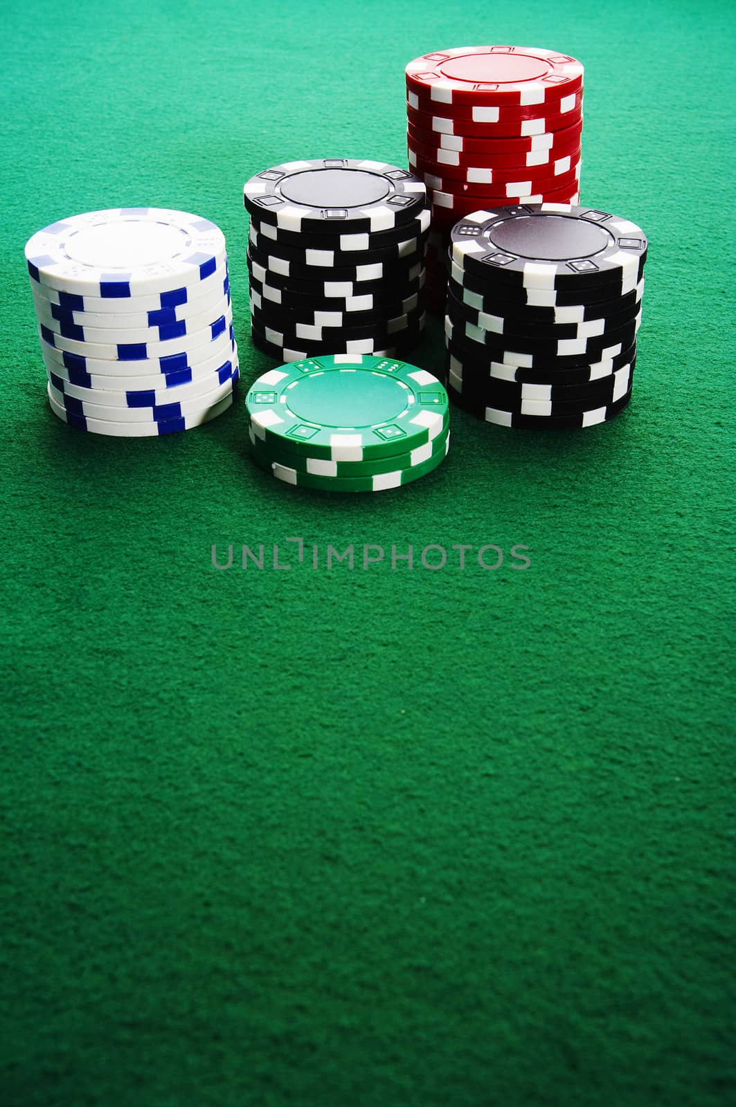 Stack of gambling chips on the table