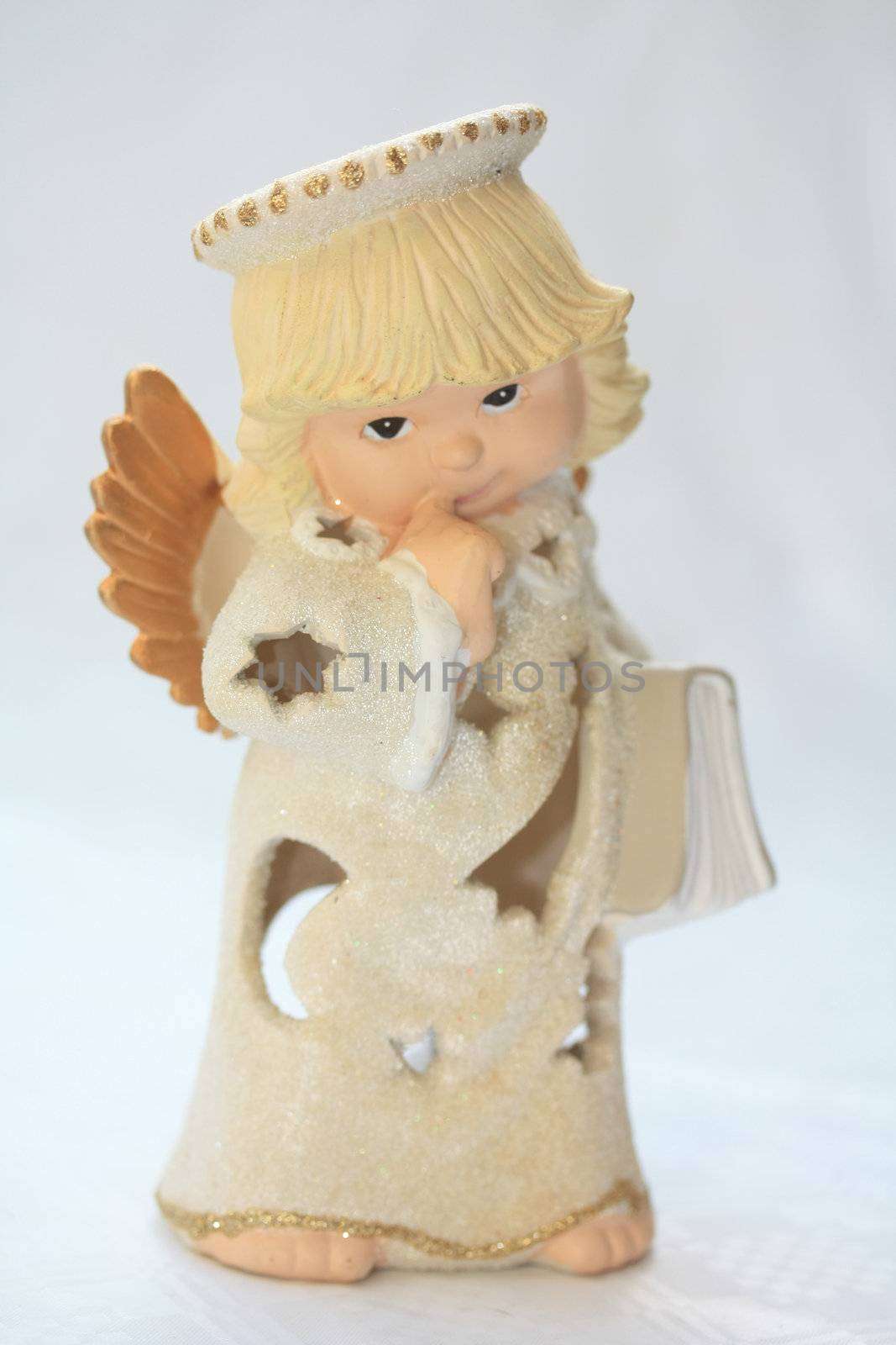 A sweet christmas angel with a bible