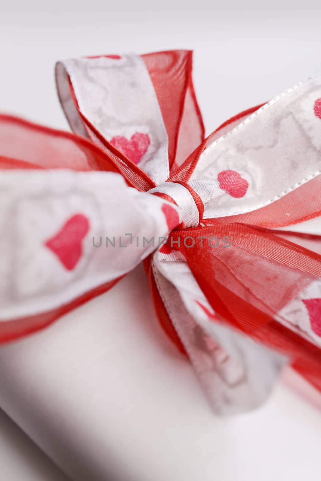close up of valentine's day gift (hearts on bow)