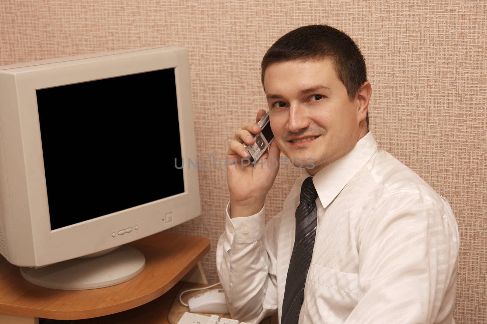 smiling man with mobile