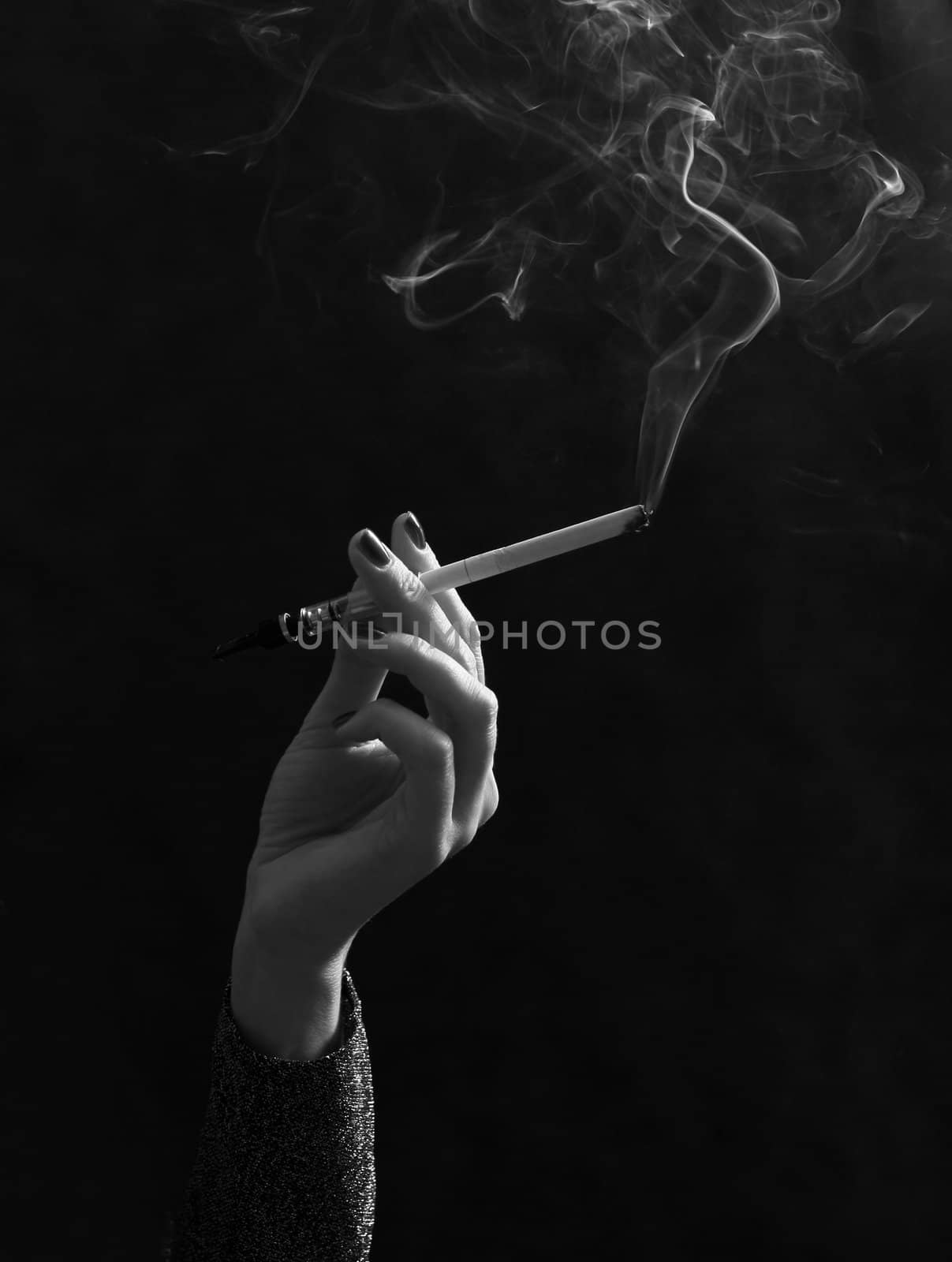 Hand with a cigarette by friday